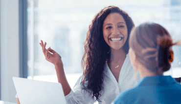 Business Women Discussing