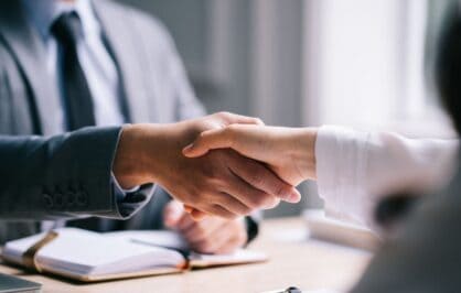 Two People Shaking Hand.
